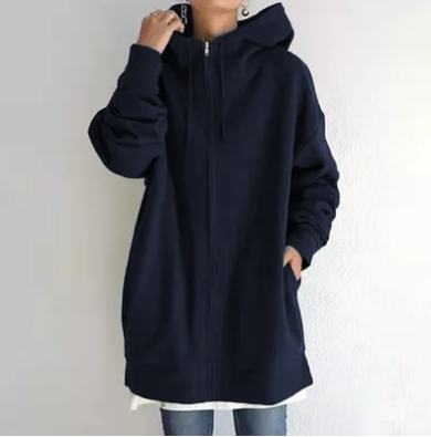 Cozy women's zip-up hoodie with relaxed fit. Comfortable, versatile, perfect for fall and winter style.