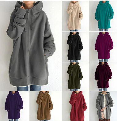 Stylish women's zip-up hoodie, relaxed fit for comfort, ideal for layering or cool weather.