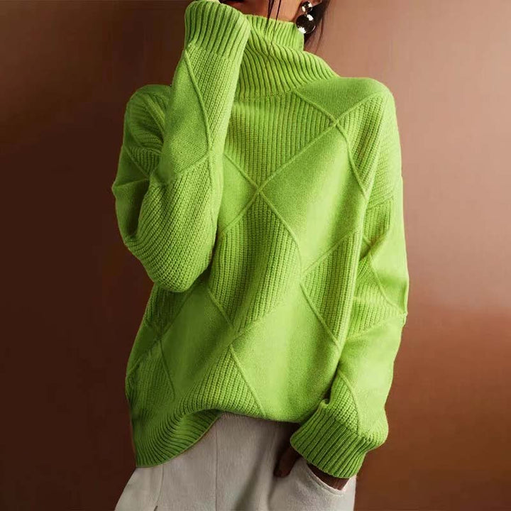 Soft knit women's high-collar sweater, a stylish and comfortable winter top.