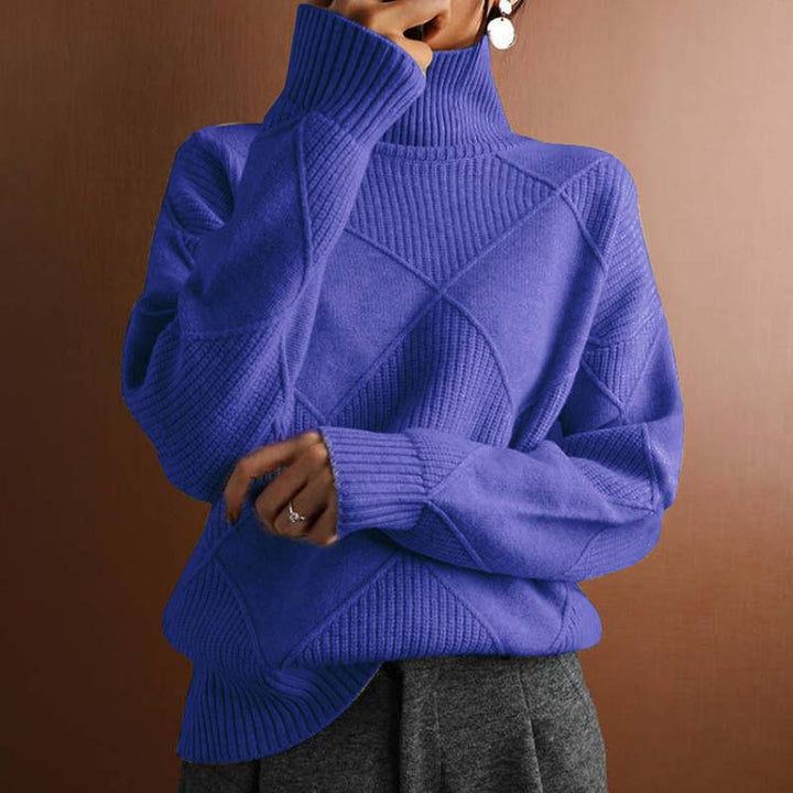Close-up of a women's cozy high-collar sweater, showing soft knit texture.