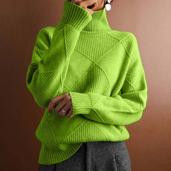Front view of a women's patterned high-collar sweater, perfect for cozy comfort.