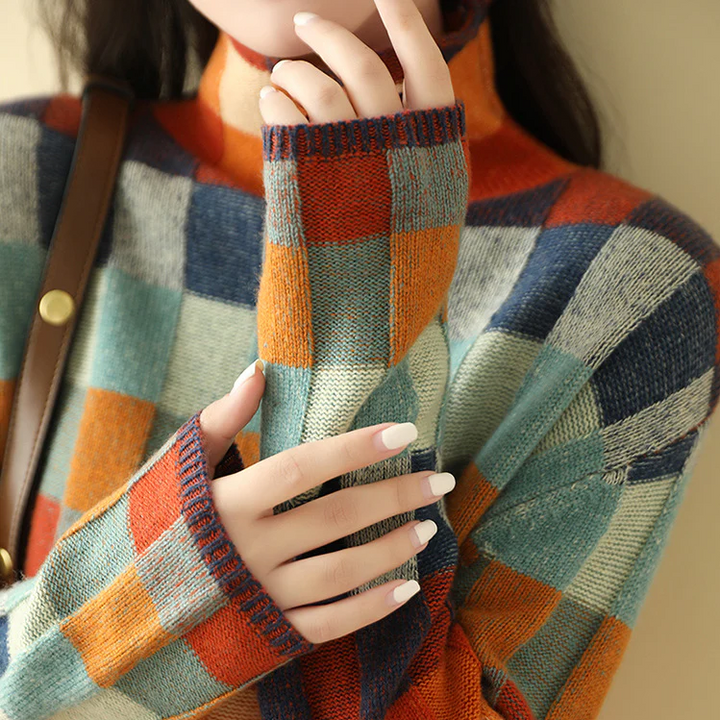 Stylish women's high-neck long sleeve sweater. Cozy melange knit pullover, ideal for autumn and winter warmth.