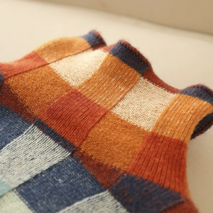 Women's sustainable cozy high-neck melange knit sweater, an elegant long sleeve pullover for autumn warmth.