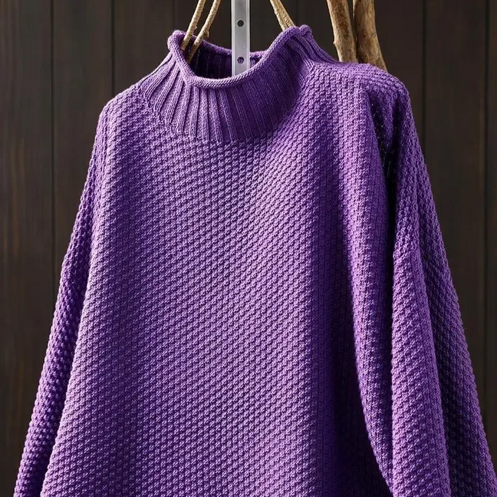 Relaxed fit women's long sleeve pullover, featuring a unique honeycomb knit texture.
