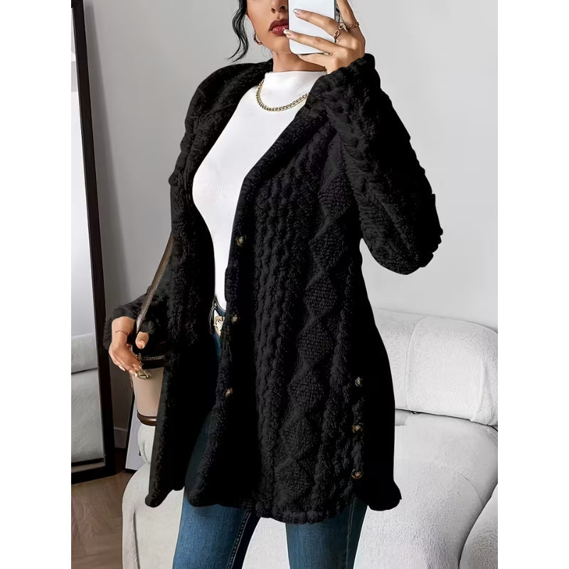Practical women's winter coat, featuring a hood & button closure, offering cozy outerwear style.