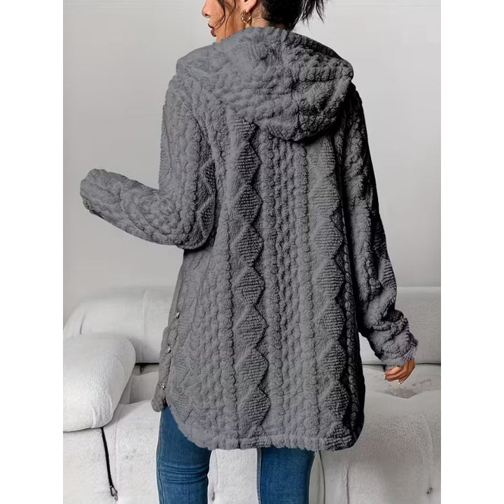 Modern women's hooded button-front fall jacket, ideal for comfortable and stylish layering.