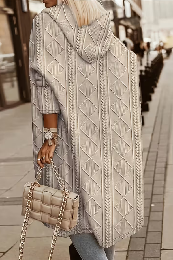 Effortlessly chic women's long hooded cardigan in a soft knit. Perfect for cozy fall and winter style.