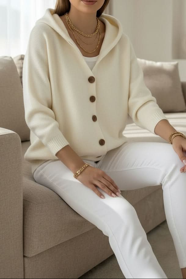 Warm hooded women's cardigan sweater, essential layering piece for winter fashion & cozy style.