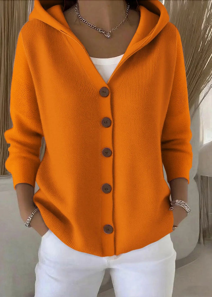Comfortable women's button-up hooded sweater, a versatile cardigan for casual winter outfits.