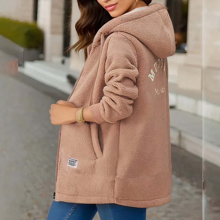 Fashionable women's hooded winter jacket. Warm fleece outerwear for casual wear and cold weather comfort.
