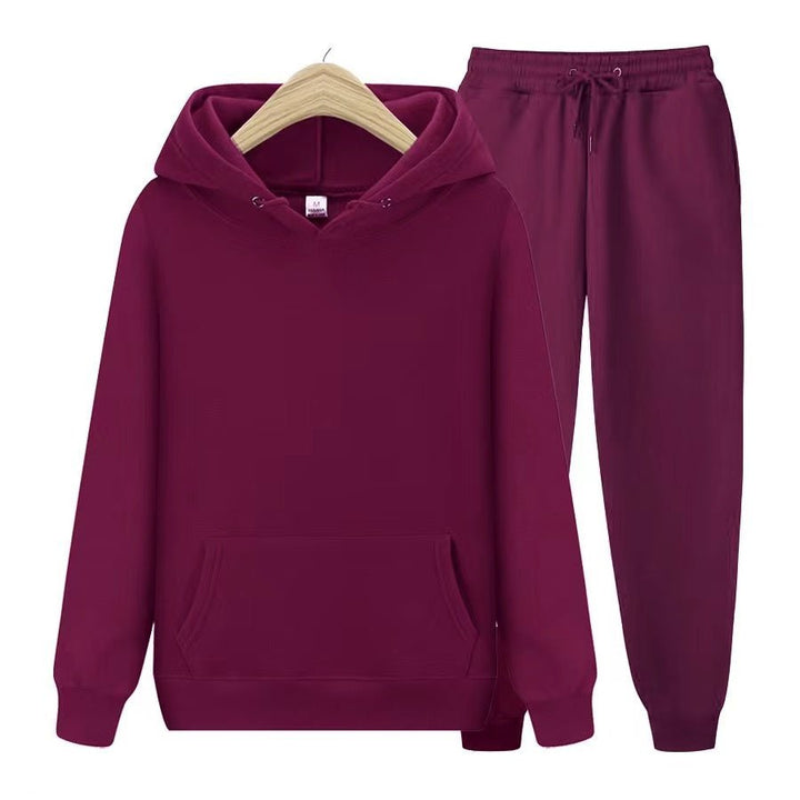 Sporty women's hooded sweatshirt & jogger set. Casual activewear twopiece for comfort, style, and everyday wear.