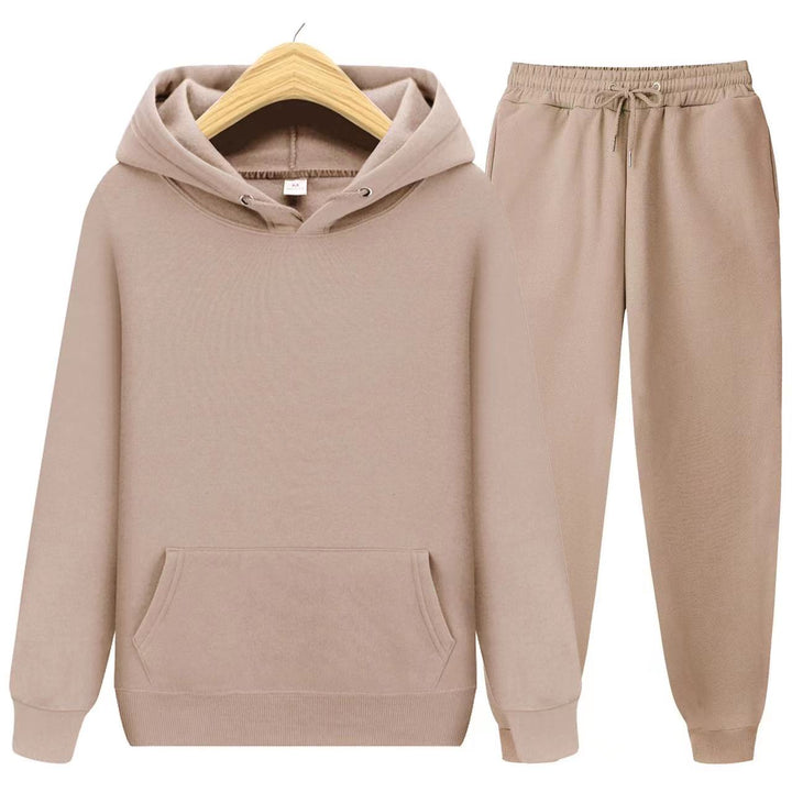 Complete women's twopiece hooded sweatshirt & jogger set. Cozy lounge wear for casual comfort, travel, & relaxation.