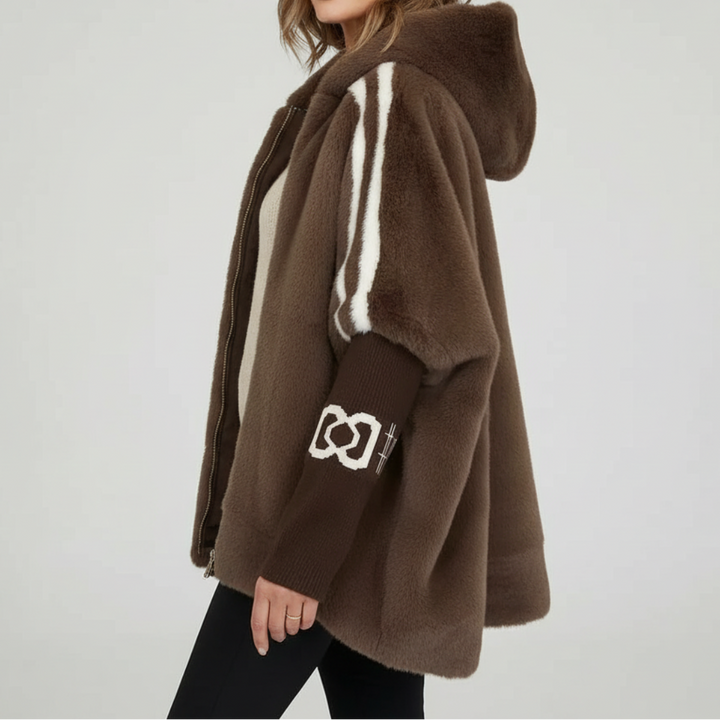 Trendy women's oversized hooded winter jacket, ideal for casual, comfortable, and warm cold weather fashion.