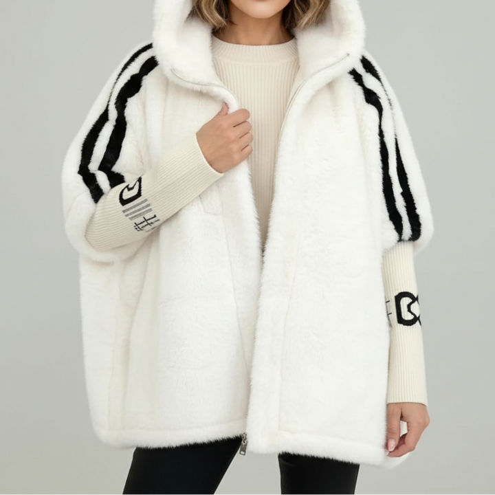Comfortable and stylish women's hooded winter coat, designed for ultimate warmth in cold weather.