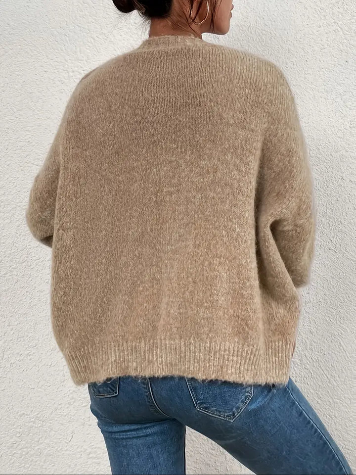 Soft khaki knitted sweater for women. A comfortable long-sleeve top, ideal for staying warm in fall & winter.