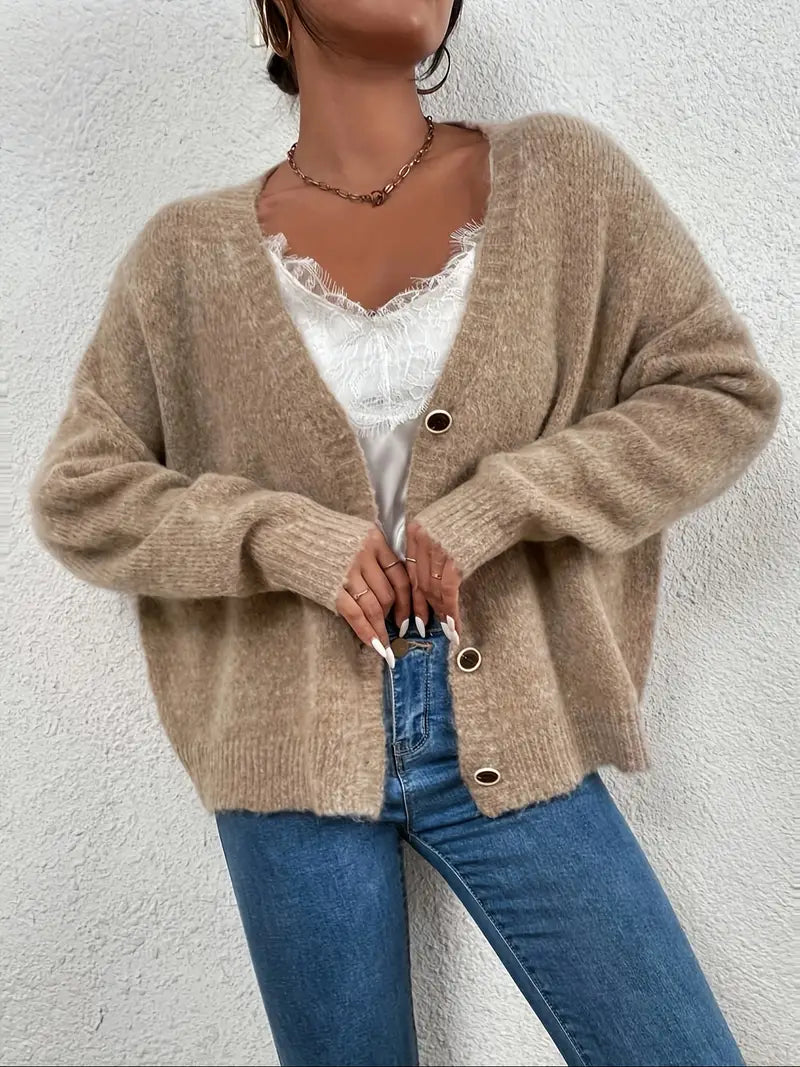 Evelyn khaki knitted comfort sweater for women, featuring a cozy texture and long sleeves for cold weather.