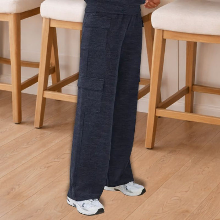 Women's stylish knit lounge set. Comfortable two-piece outfit with soft hoodie & wide-leg pants for casual wear.