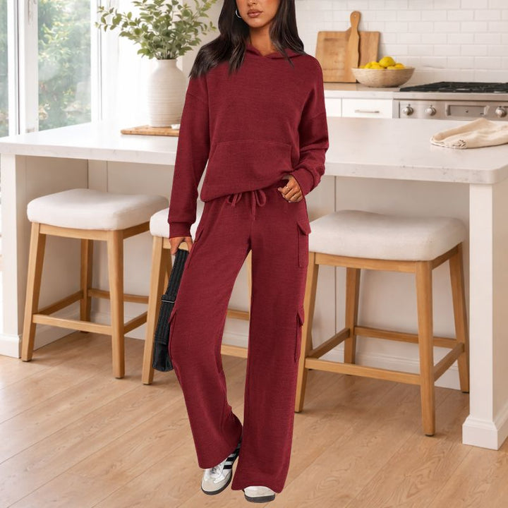 Soft & cozy women's knit lounge set. Two-piece outfit featuring a hoodie and wide-leg pants for relaxed style.