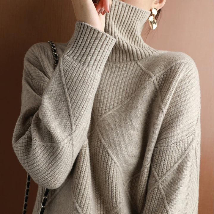 Women's autumn wear: Elegant turtleneck sweater. Soft, warm top for comfortable style.