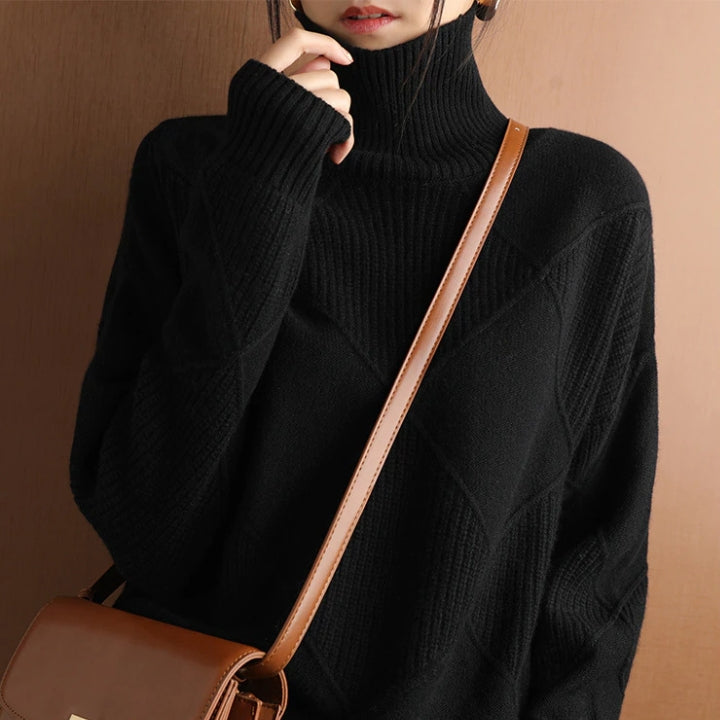 Stylish women's long sleeve turtleneck sweater. Effortless style, warm for autumn wear.