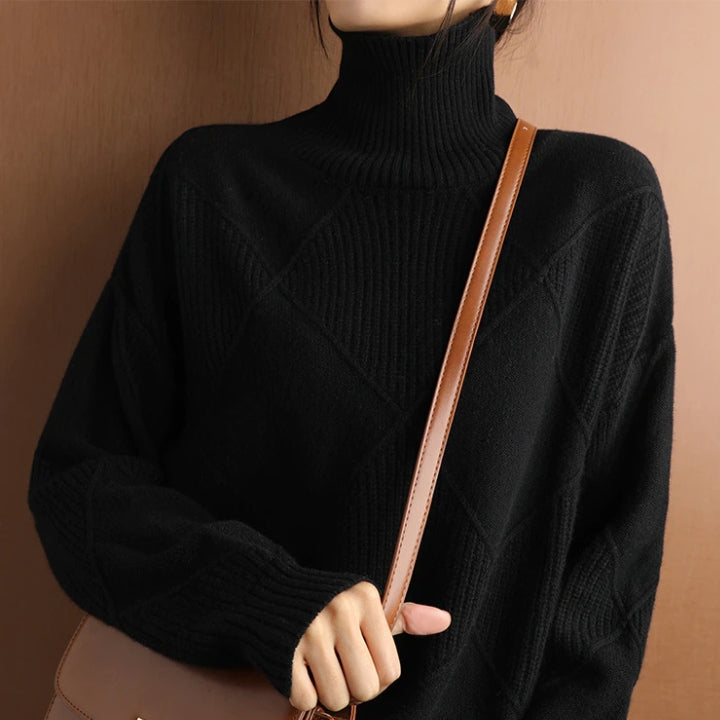 Women's cozy turtleneck sweater, front view. Elegant style, warm top for cold weather.