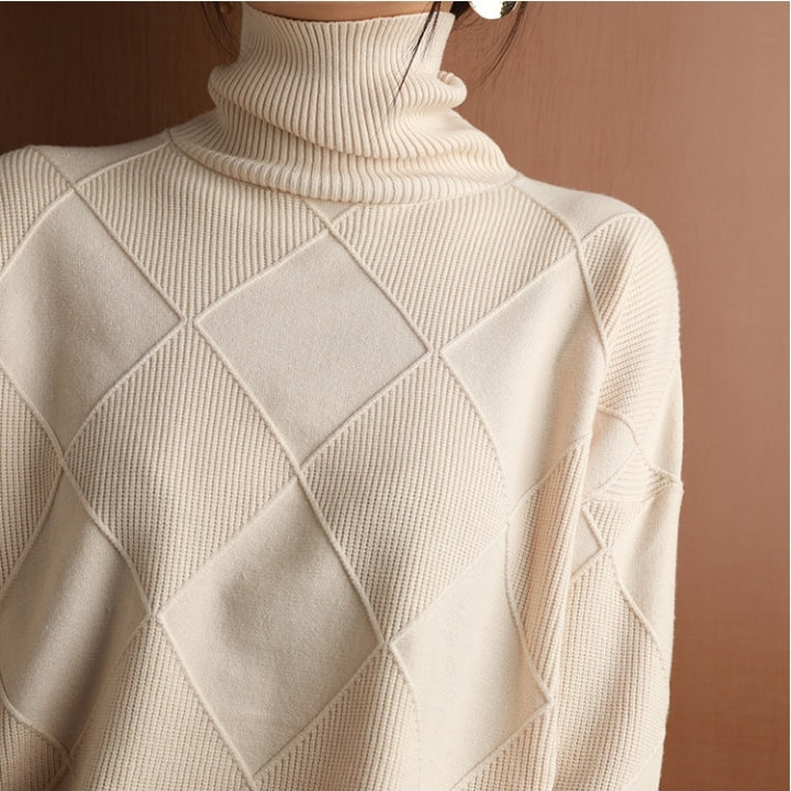 Women's casual chic turtleneck sweater. Comfortable long sleeve pullover for autumn wear.