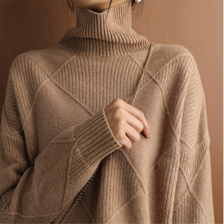 Warm women's turtleneck top. Effortless style with a cozy knit for winter fashion.