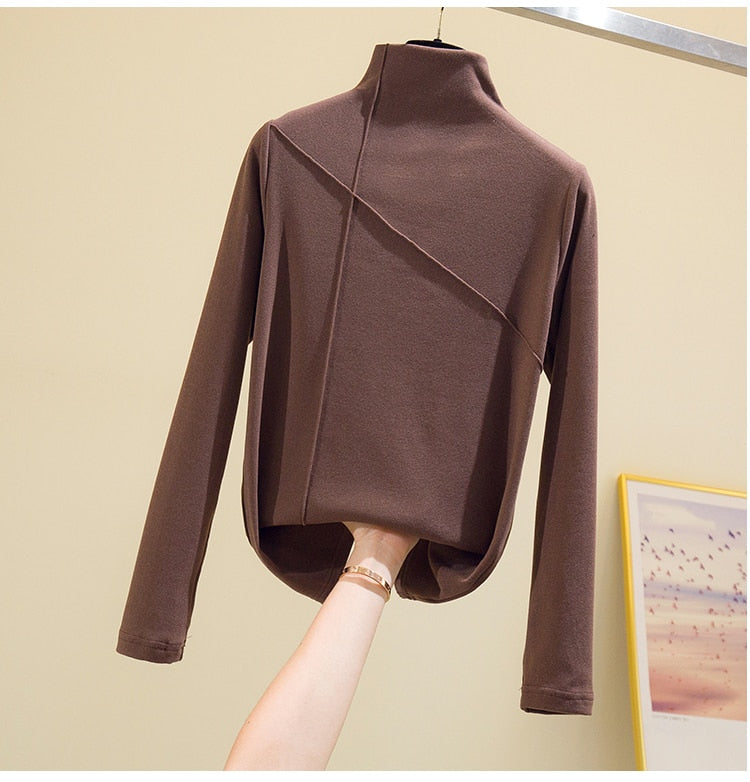 Women's cozy knit turtleneck sweater in a versatile color, perfect for fall & winter layering.