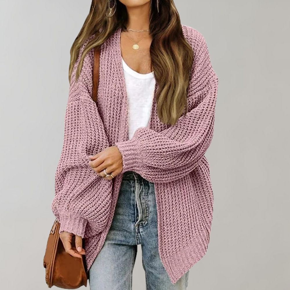 Soft women's knitwear cardigan, a cozy and comfortable layering piece for stylish casual outfits.