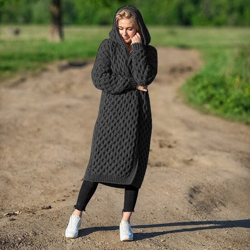 Women's cozy knitted hooded cardigan with pockets, perfect for fall and winter comfort. Soft and warm outerwear.