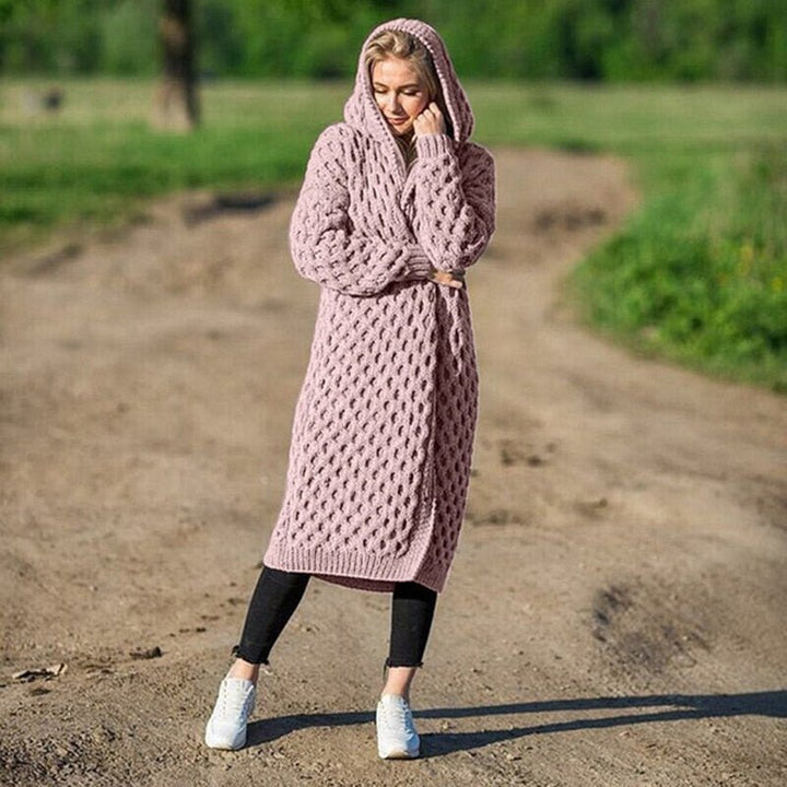 Longline open-front women's knitted cardigan with hood & pockets. Soft, warm, and versatile fall fashion.