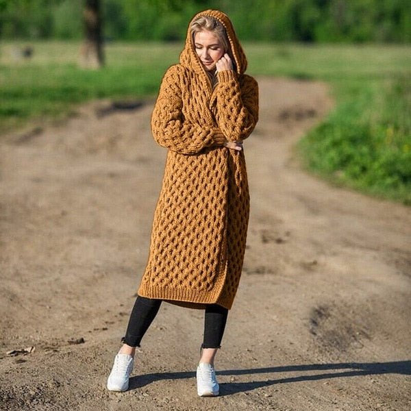 Versatile women's hooded knitted cardigan. Cozy, warm, and soft with pockets, ideal for layering fall/winter outfits.