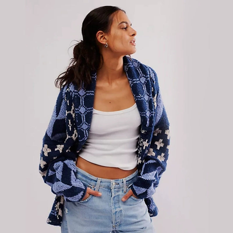 Comfortable & warm women's oversized knitted cardigan. Perfect cozy outerwear for winter style.
