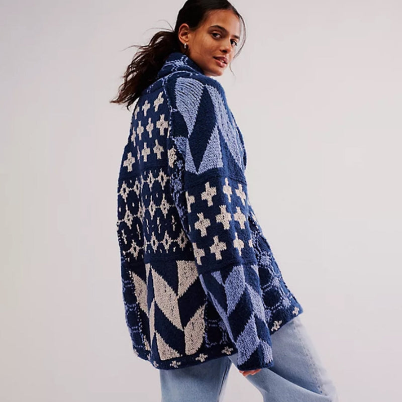Stylish women's oversized knitted cardigan. A cozy, long sleeve sweater with a chic geometric pattern.