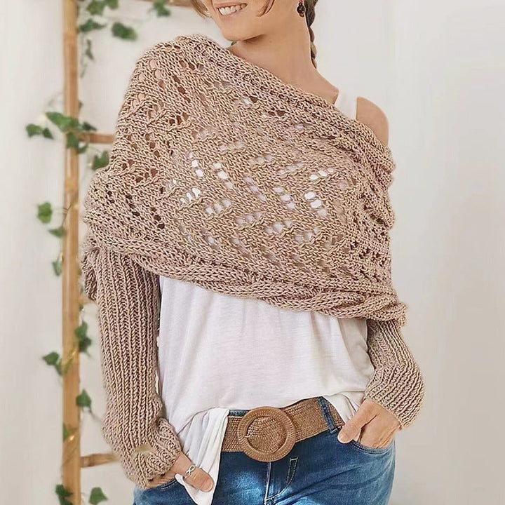 Knitted scarf with sleeves, a versatile women's wrap for cozy fashion. One-size, elegant, and perfect winter accessory.