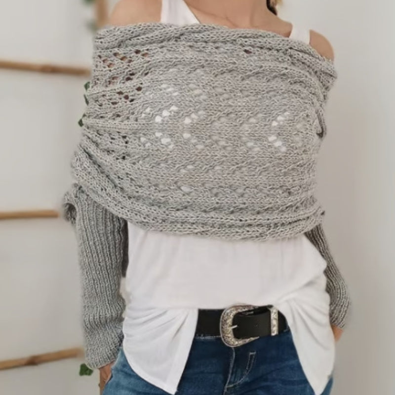 Women's knitted scarf with sleeves, offering soft comfort. A cozy, hypoallergenic, one-size wrap for elegant fall fashion.
