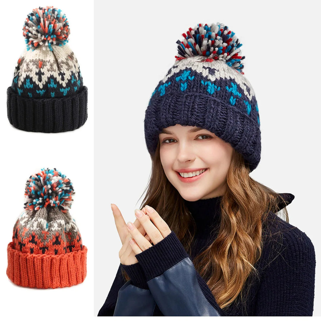 Chic women's snowflake pom beanie, a warm & stylish accessory for chilly winter days.