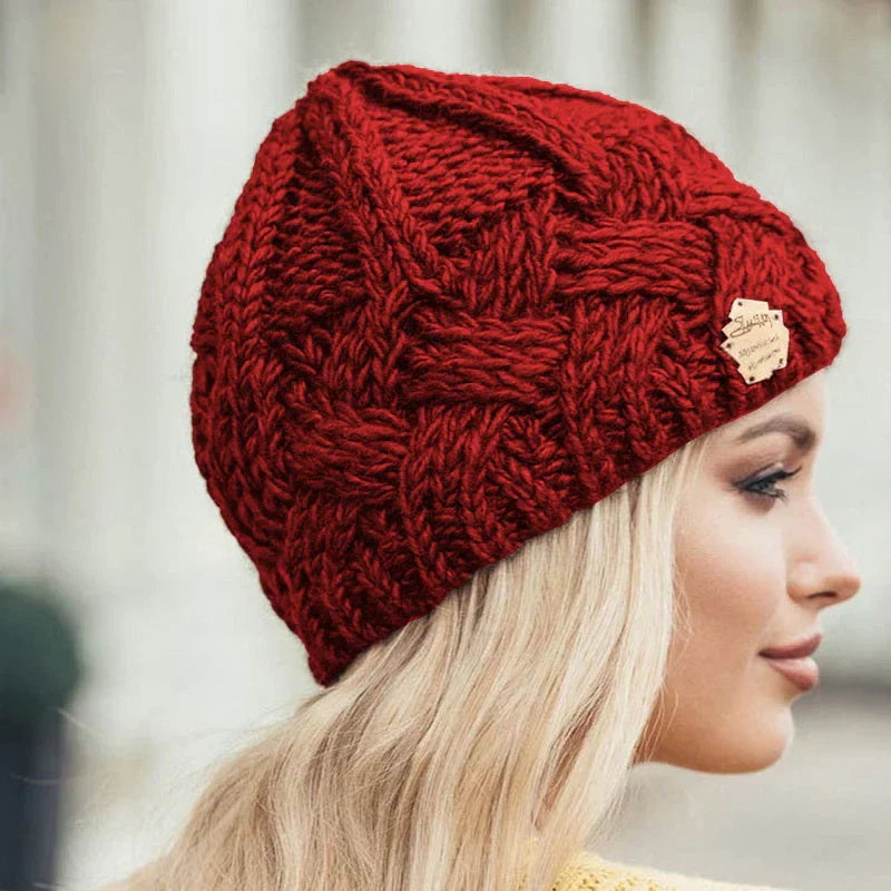Women's warm knitted winter hat, perfect for outdoor adventures and staying cozy in cold weather.