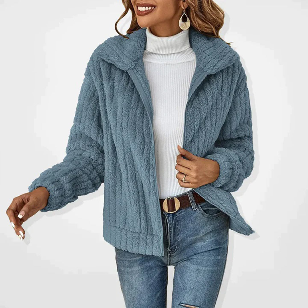 Comfortable women's long fleece vest for cozy warmth, ideal outerwear for fall & winter.