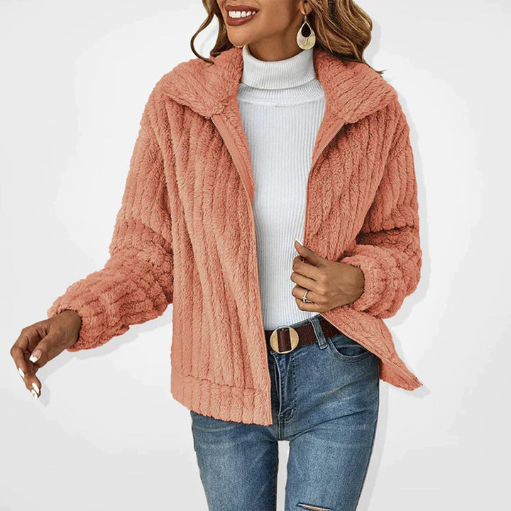 Elegant women's long fleece vest cardigan, offering comfortable warmth & stylish layering for any outfit.