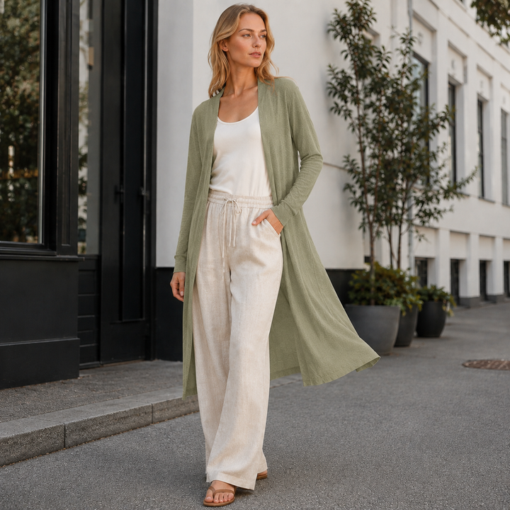 Versatile women's long knit cardigan, offering warmth & style as a perfect layering top.