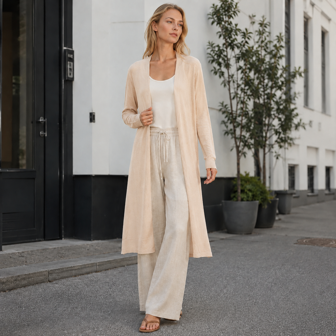 Effortless women's long knit cardigan, ideal for everyday wear & versatile layering.