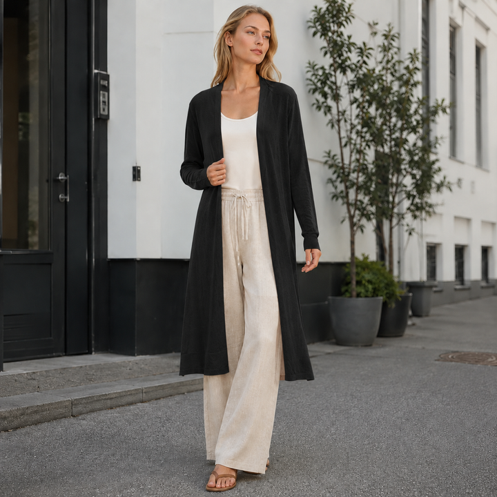 Chic women's long knit cardigan, a perfect layering top for versatile autumn outfits.