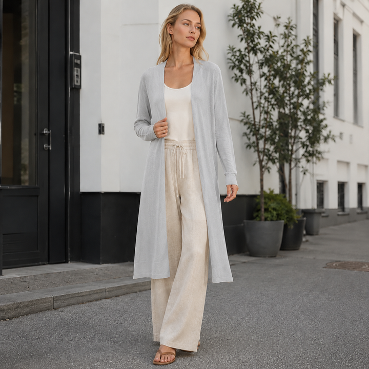 Elegant women's long knit cardigan, providing warmth & style for versatile outerwear.