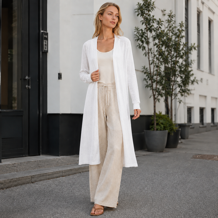 Soft knit women's cardigan, long style for cozy layering and effortless autumn fashion.