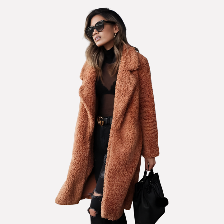 Chic women's longline teddy coat, soft texture, notched collar, stylish winter fashion outerwear.