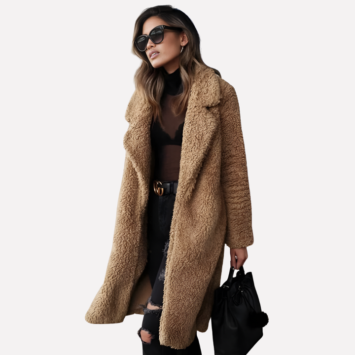 Warm & cozy women's longline teddy coat. Soft fleece jacket with notched collar for winter comfort.