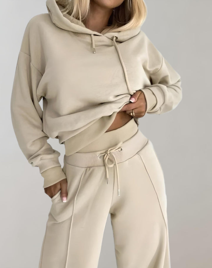 Women's cozy loungewear set with soft hoodie and wide-leg pants. Perfect comfortable matching casual outfit.