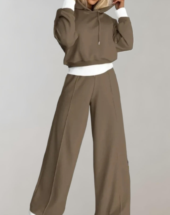 Stylish women's two-piece set featuring a plush hoodie and comfy wide-leg lounge pants for ultimate relaxation.