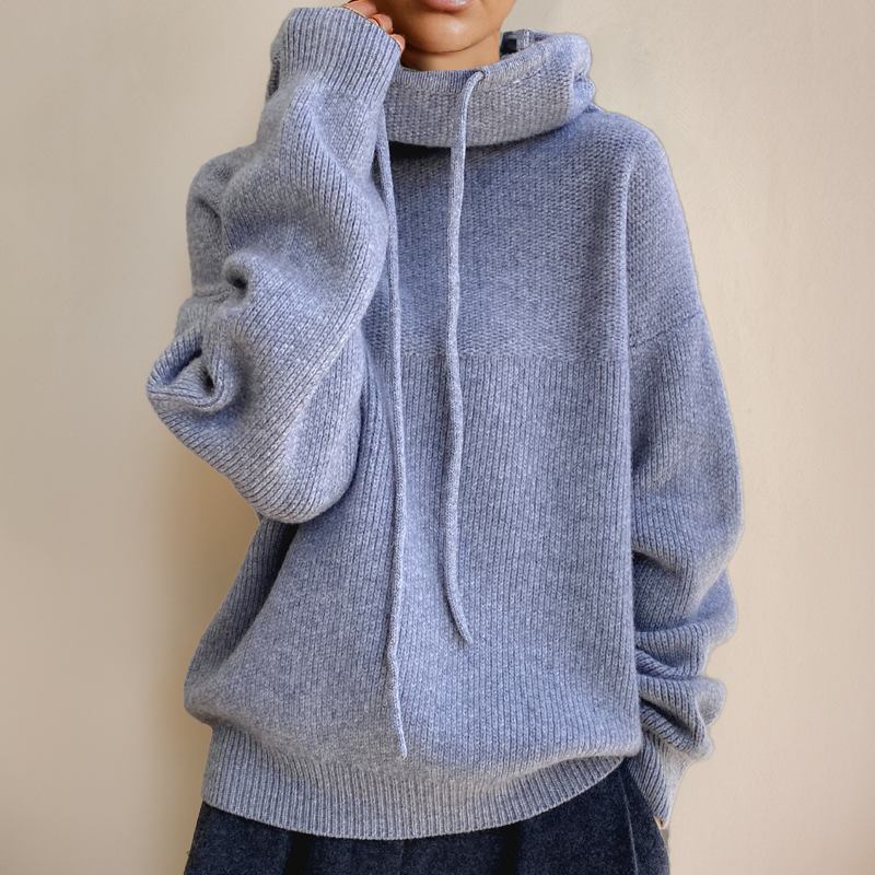 Elegant women's high-collar merino wool pullover sweater, chic long-sleeve top for cozy comfort.